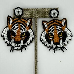 GAMEDAY EARNINGS. TIGER FACE,